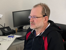 Karsten Espey im Videocall mit Kunden